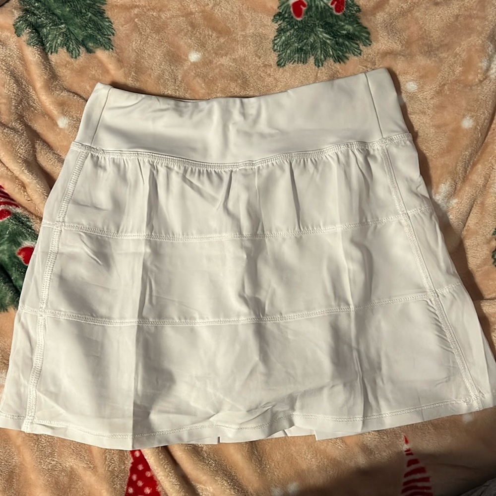 Tennis Skirt Never worn! Size small fits like a medium! Perfect condition!